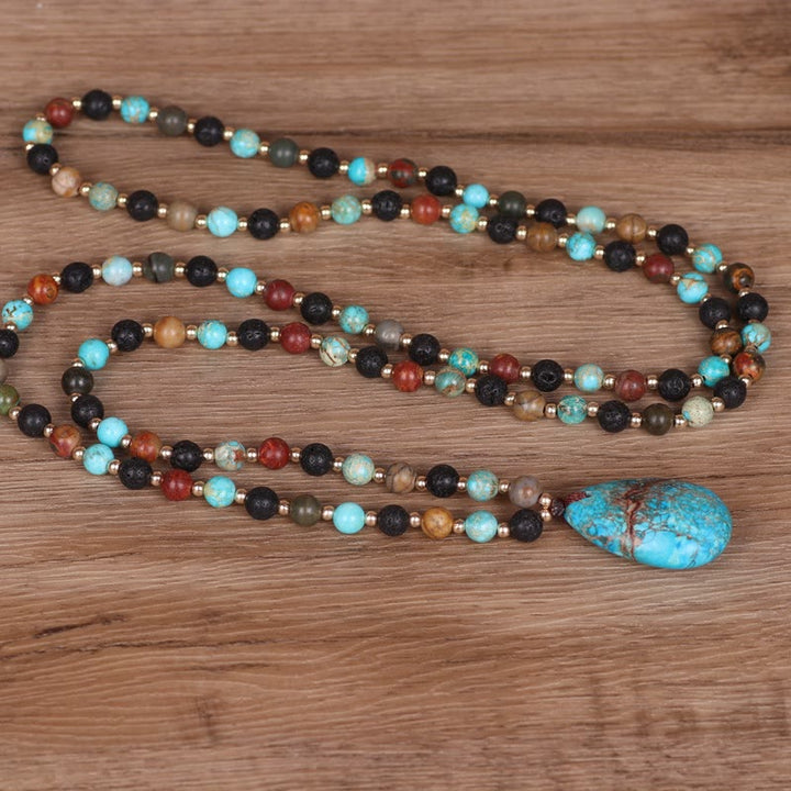 Collana di perline Mala con ciondolo a forma di goccia turchese Olivenorma