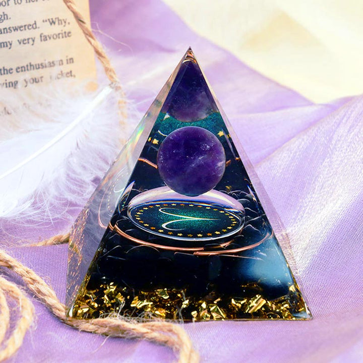 Sfera di ametista Olivenorma con piramide di orgone dello zodiaco Ariete in ossidiana 