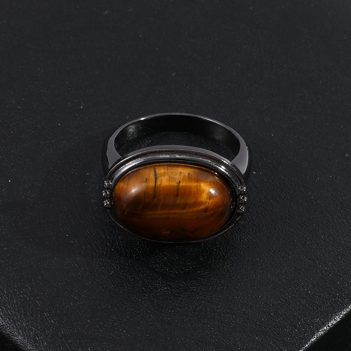 Olivenorma Anello regolabile nero ovale con occhio di tigre