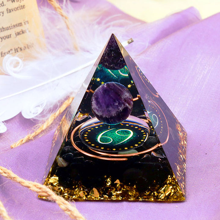 Sfera di ametista Olivenorma con piramide di orgone dello zodiaco Cancro in ossidiana 