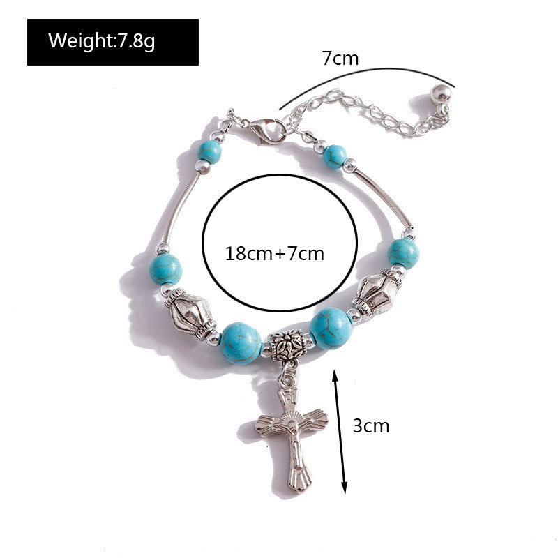 Bracciale con ciondolo a croce con perline turchesi Olivenorma