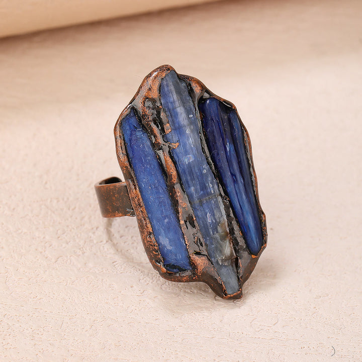 Anello regolabile con apertura irregolare grezza in cianite Olivenorma