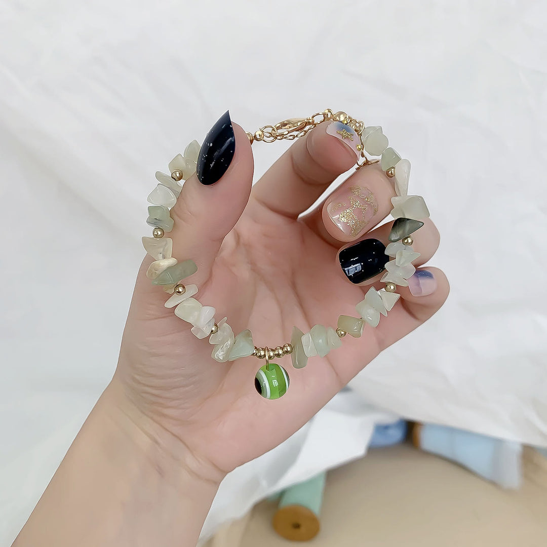 Braccialetto con ciondolo in ghiaia di cristallo naturale Olivenorma contro il malocchio 