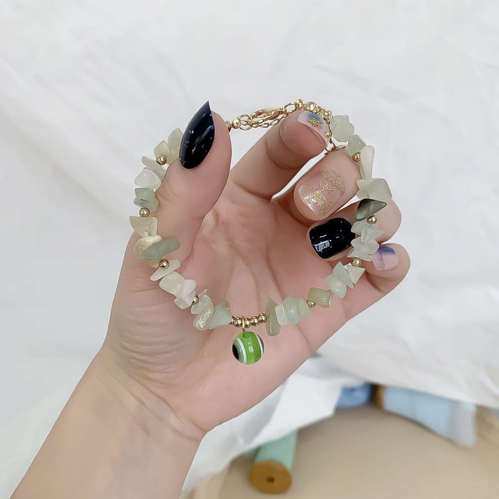 Braccialetto con ciondolo in ghiaia di cristallo naturale Olivenorma contro il malocchio 