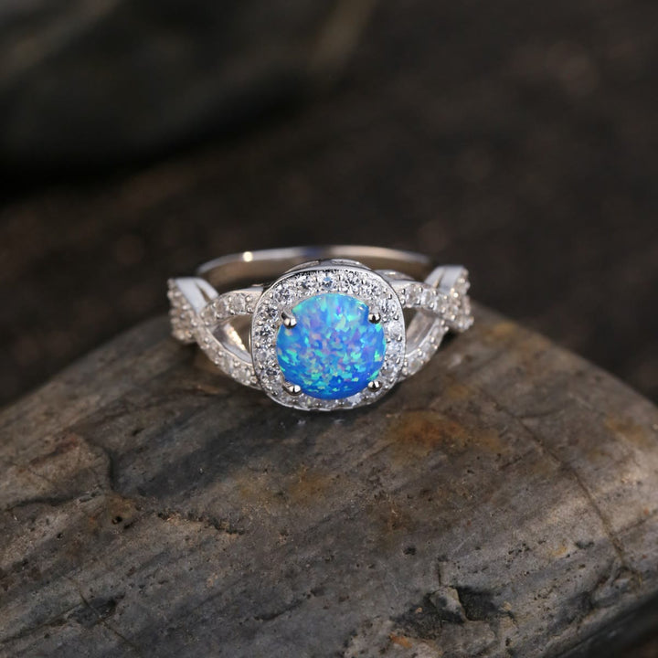 Anello Olivenorma in argento sterling 925 con zircone bianco e opale blu