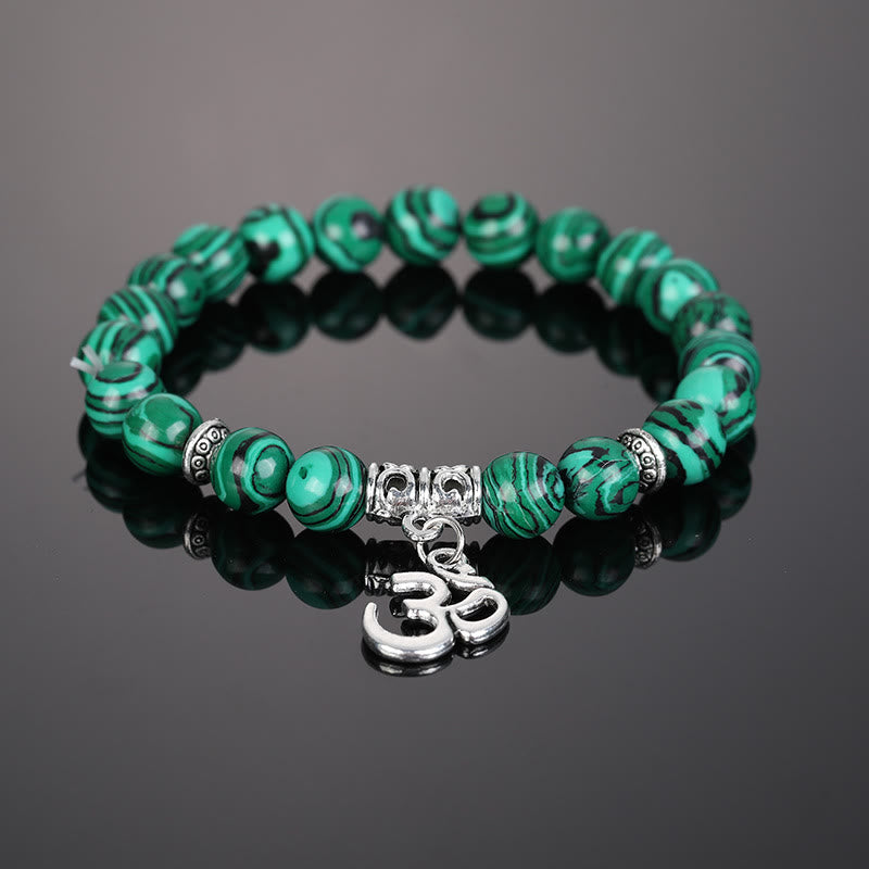 Bracciale con simbolo Om in perline di cristallo naturale Olivenorma