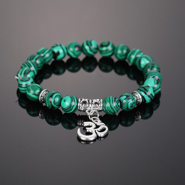 Bracciale con simbolo Om in perline di cristallo naturale Olivenorma