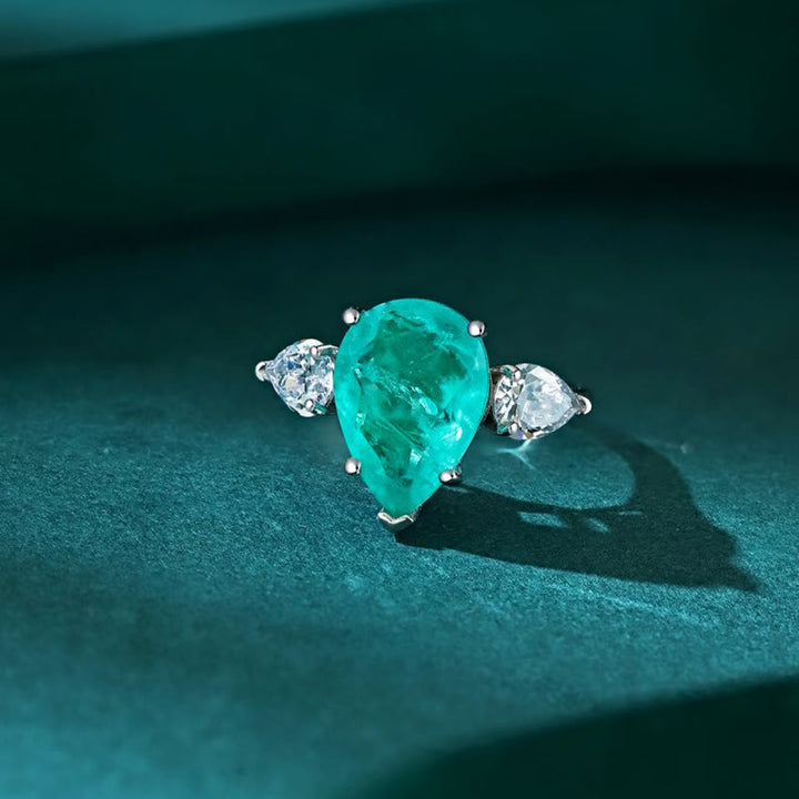 Anello squisito con tormalina Paraiba Olivenorma e zircone bianco