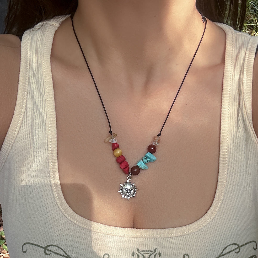 Collana in filo di cera di pelle con nappa a farfalla in pietra naturale Olivenorma