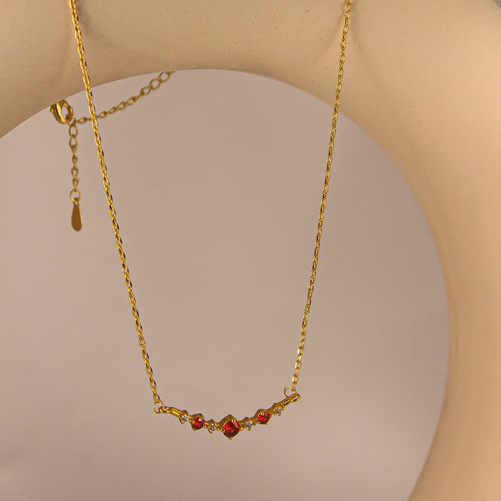 Collana Olivenorma "Simbolo dell'Indipendenza" con granato e diamanti