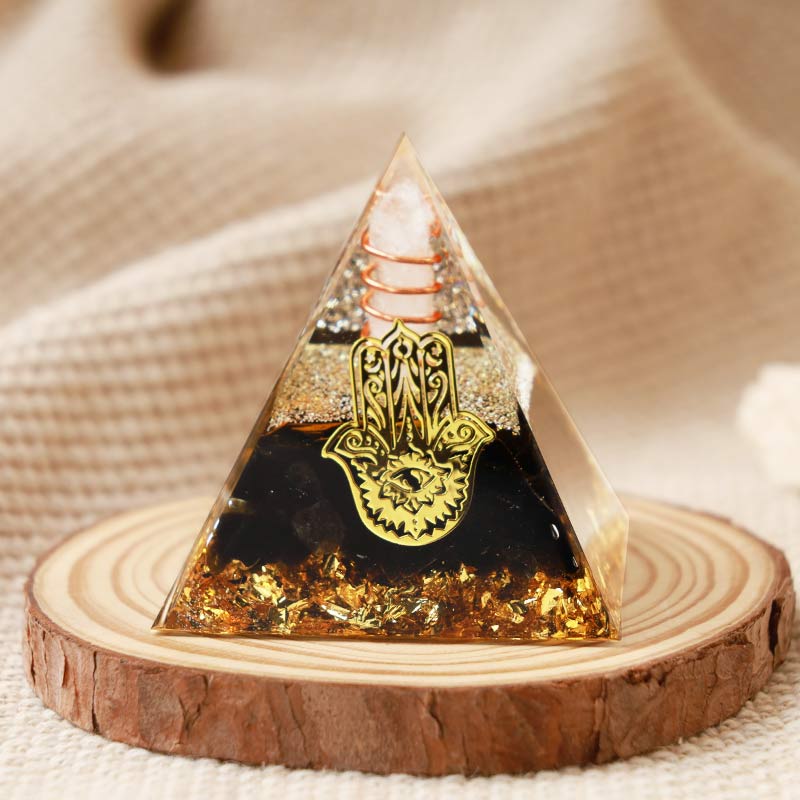 Olivenorma Cristallo trasparente con piramide di ossidiana Hamsa Orgone 
