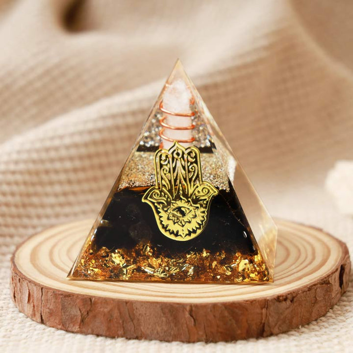 Olivenorma Cristallo trasparente con piramide di ossidiana Hamsa Orgone 