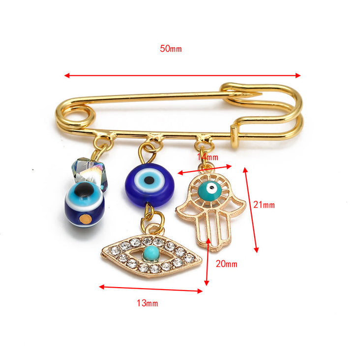 Spilla serie Hamsa con occhio malvagio Olivenorma