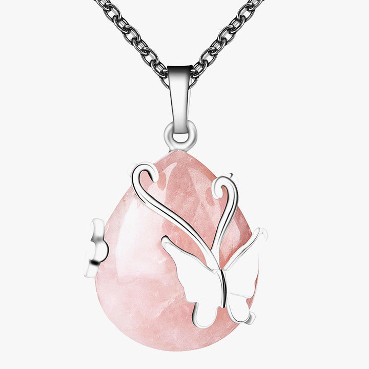 Collana con pietre preziose e ali di farfalla in cristallo