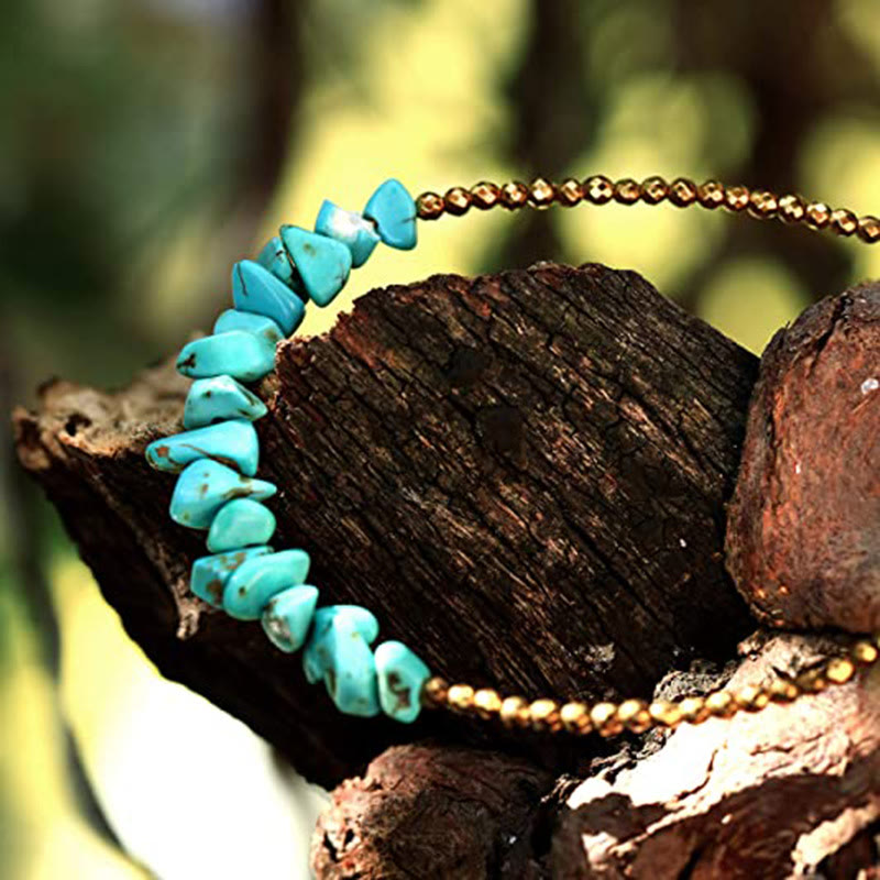 Bracciale Olivenorma con catena in oro e perline turchesi 
