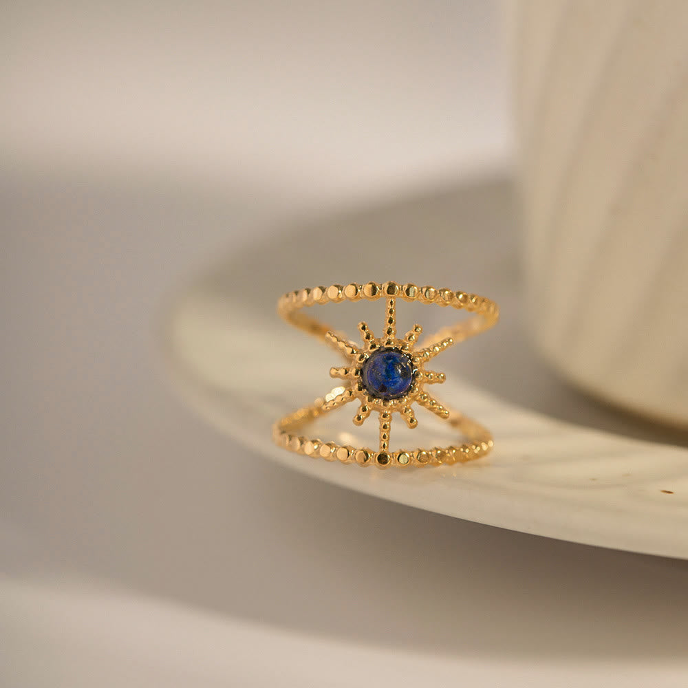 Anello con gemma a forma di stella a otto punte e doppia fila di girasole Olivenorma