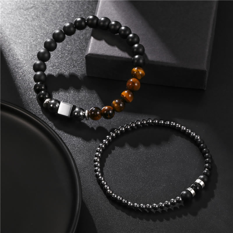 Olivenorma Set di bracciali elastici con cubo nero in occhio di tigre satinato
