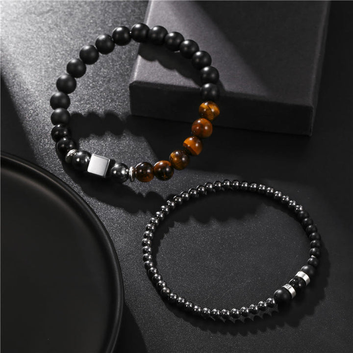 Olivenorma Set di bracciali elastici con cubo nero in occhio di tigre satinato