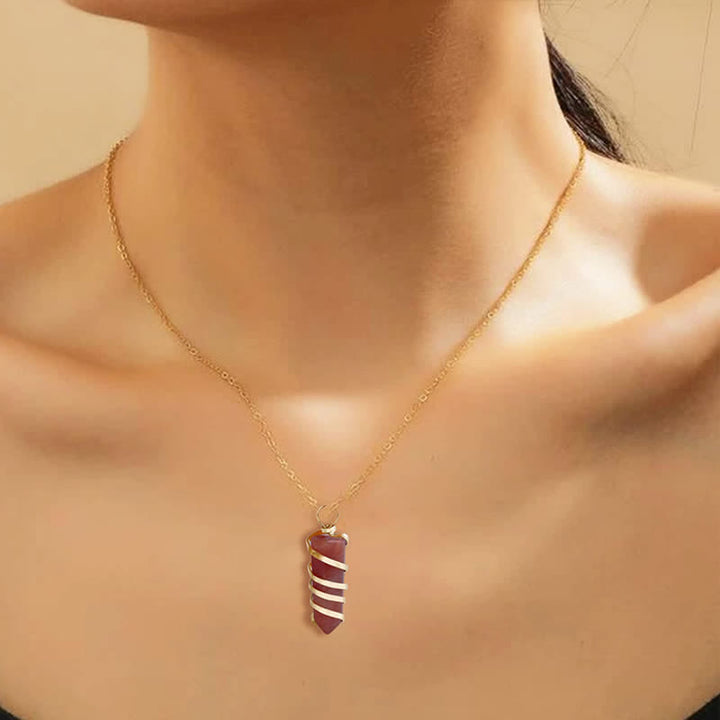 Collana di cristallo con testa di proiettile esagonale a forma di corniola Olivenorma