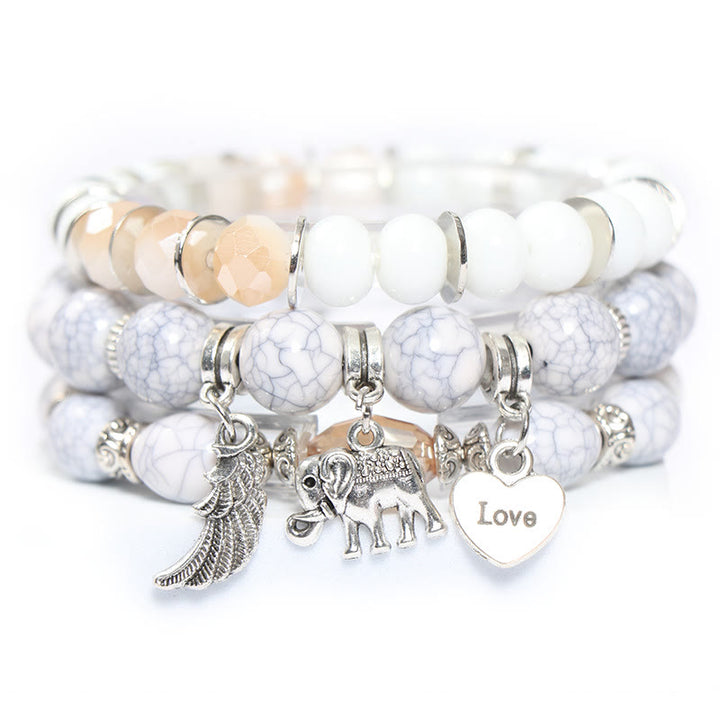 Olivenorma Set di bracciali con perline e ciondolo a forma di cuore con ali di elefante