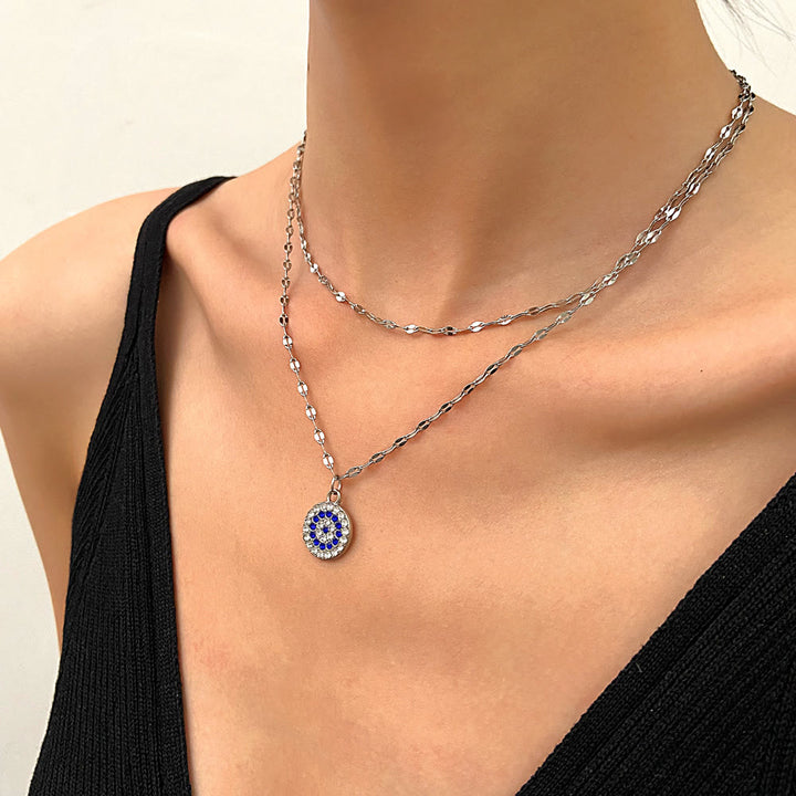 Collana in lega doppia con zircone bianco e malocchio Olivenorma