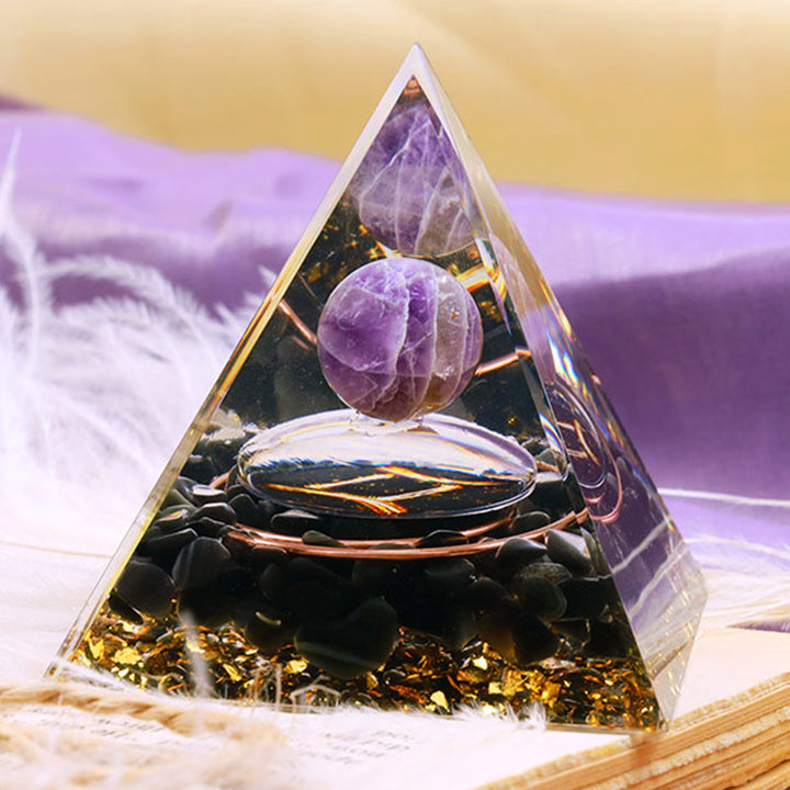 Sfera di ametista Olivenorma con piramide di orgone dello zodiaco Gemelli in ossidiana 