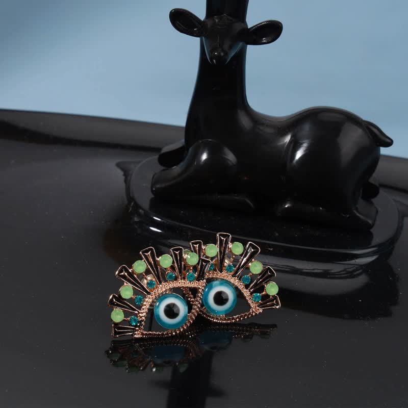 Olivenorma "Occhio della Sventura" - creativi Orecchini in zaffiro con pavone