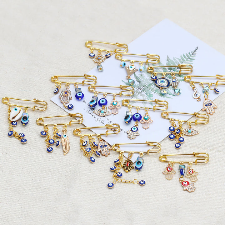 Spilla serie Hamsa con occhio malvagio Olivenorma