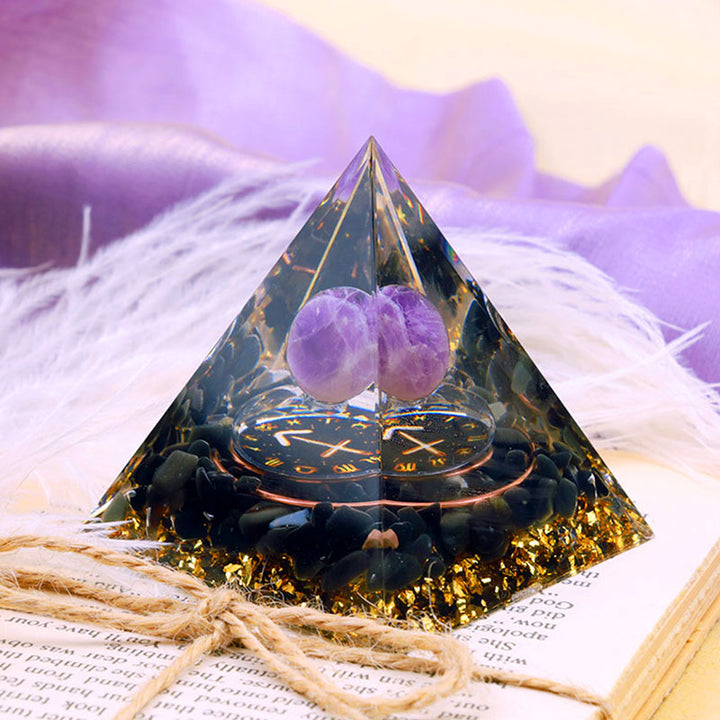 Sfera di ametista Olivenorma con piramide di orgone dello zodiaco Sagittario in ossidiana 