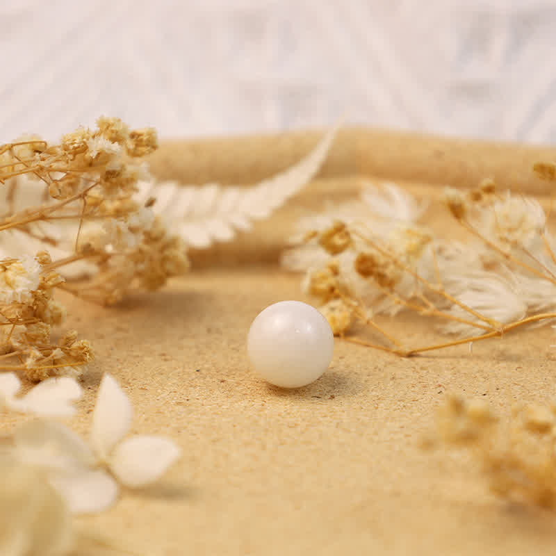 Sfera di cristallo di trasformazione in giada bianca Olivenorma