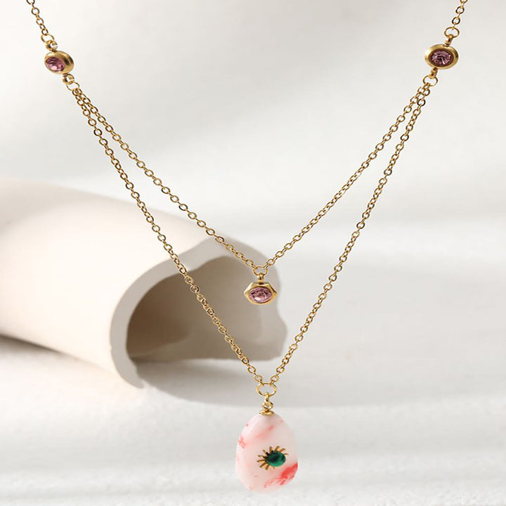Collana Olivenorma con doppio pannello in zirconio rodocrosite 