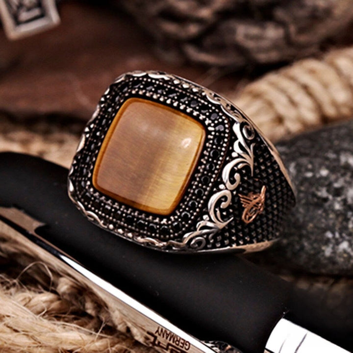 Anello da uomo Olivenorma in metallo con occhio di tigre inciso