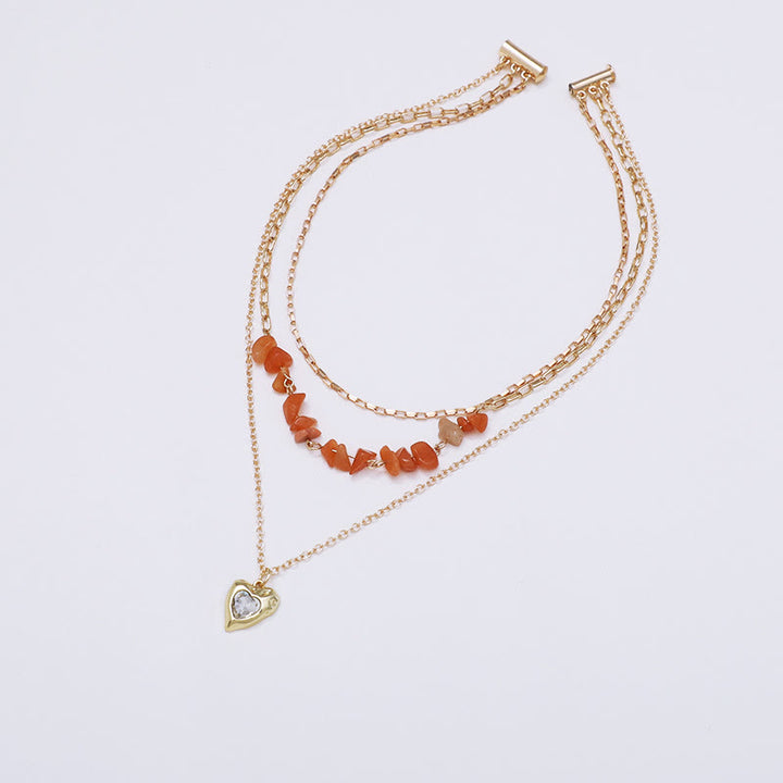 Collana a strati con ciondolo a forma di cuore irregolare in zircone bianco e agata Olivenorma