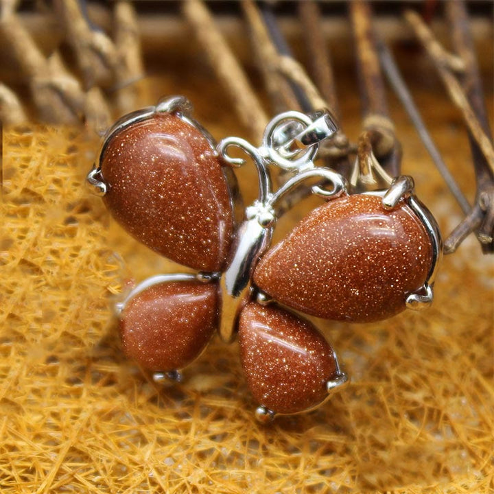 Collana a farfalla con pietra preziosa di cristallo naturale Olivenorma