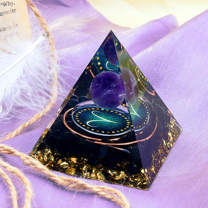 Sfera di ametista Olivenorma con piramide di orgone dello zodiaco Ariete in ossidiana 