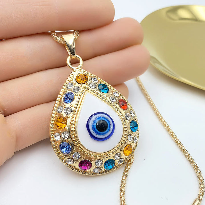 Collana con ciondolo a forma di catena con zircone HAMSA e occhio malvagio