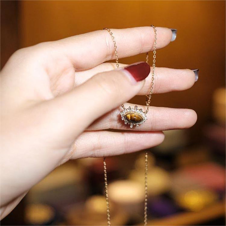 Collana con clavicola in stile palazzo in occhio di tigre naturale Olivenorma