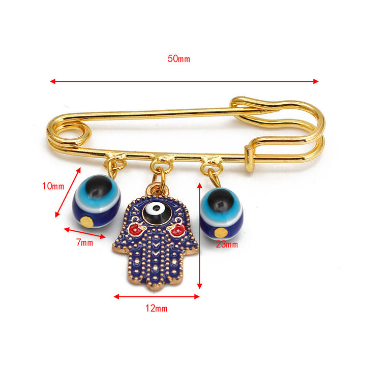 Spilla serie Hamsa con occhio malvagio Olivenorma