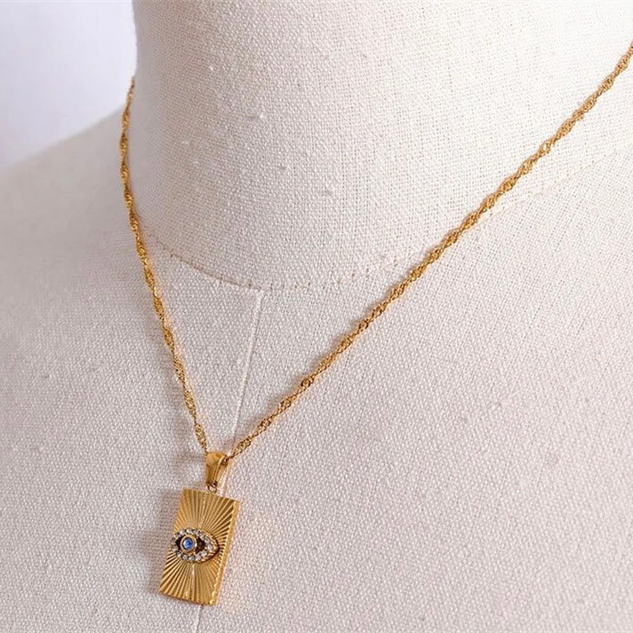 Collana con occhio maligno Olivenorma , topazio blu e zircone bianco 