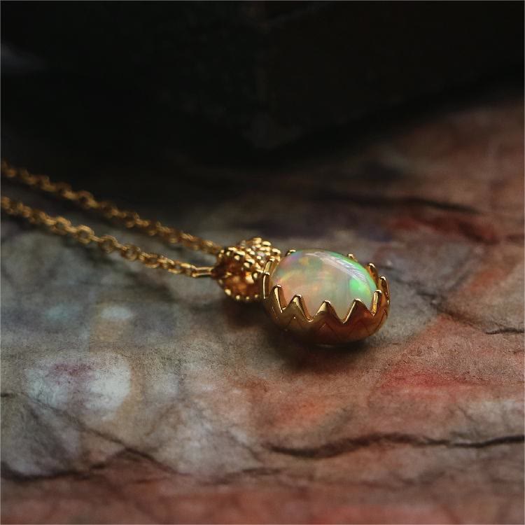 Collana con anello dorato giallo opale Olivenorma