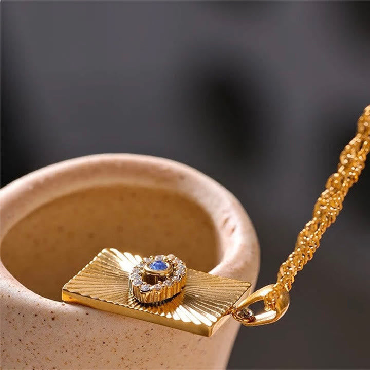 Collana con occhio maligno Olivenorma , topazio blu e zircone bianco 