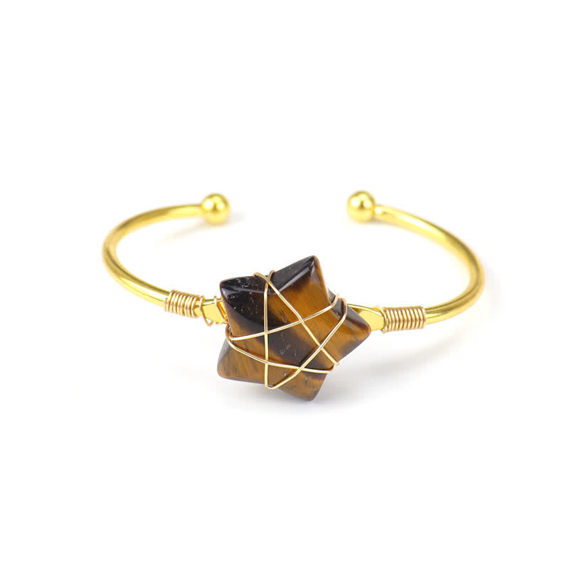 Bracciale Olivenorma con pietre preziose a forma di stella avvolte in filo d'oro