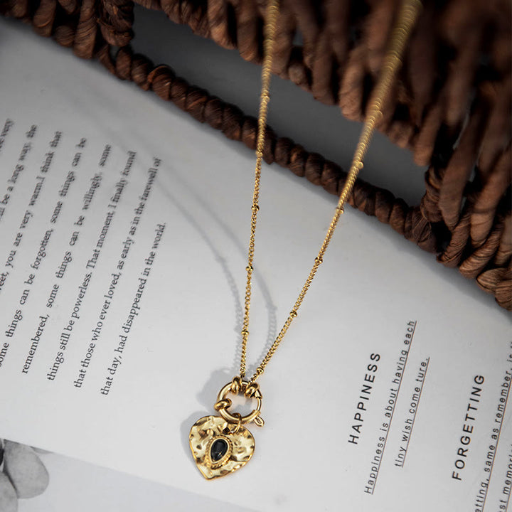 Collana con ciondolo in acciaio al titanio con cuore turchese nero Olivenorma 