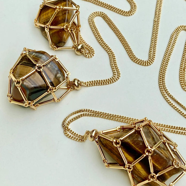 Collana con ciondolo in pietra grezza di cristallo Olivenorma e rete metallica in pietra 