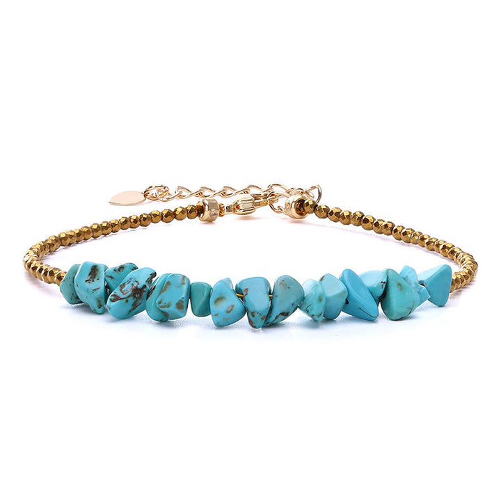 Bracciale Olivenorma con catena in oro e perline turchesi 