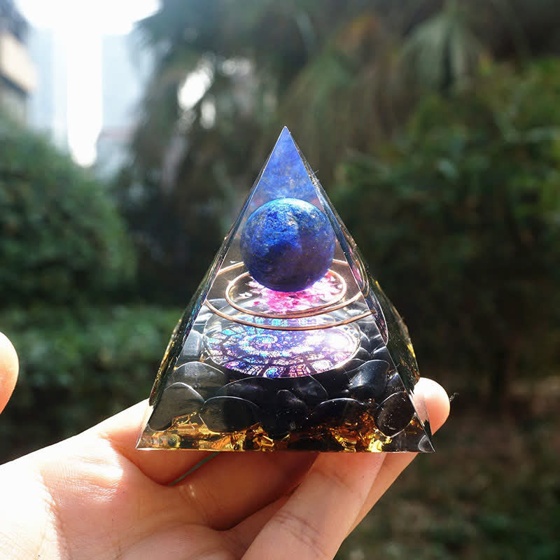 Sfera di lapislazzuli Olivenorma con piramide di orgone di ossidiana 