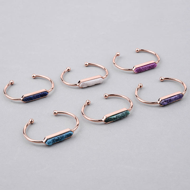 Olivenorma Bracciale rigido in rame e metallo con cristalli naturali 