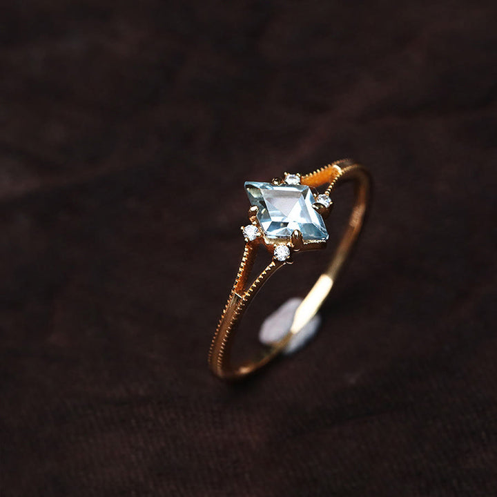 Anello Olivenorma con acquamarina, zircone bianco e diamanti