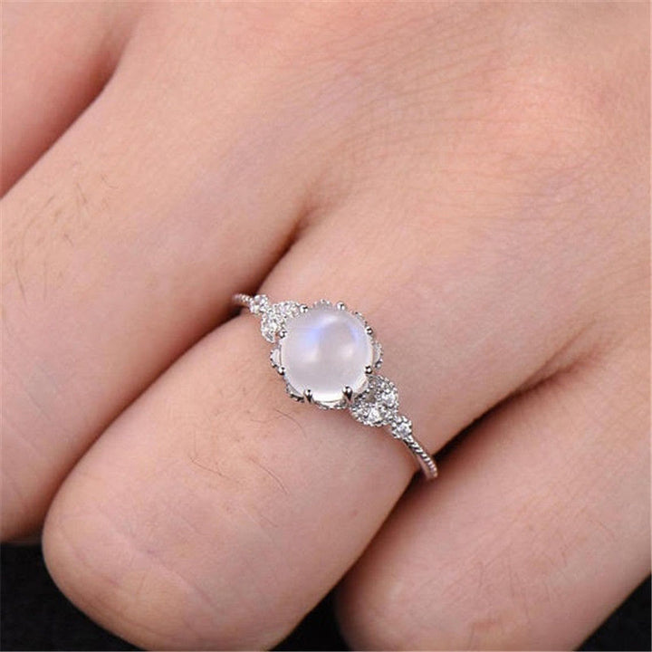 Anello Olivenorma con pietra di luna rotonda e opale e zircone bianco 