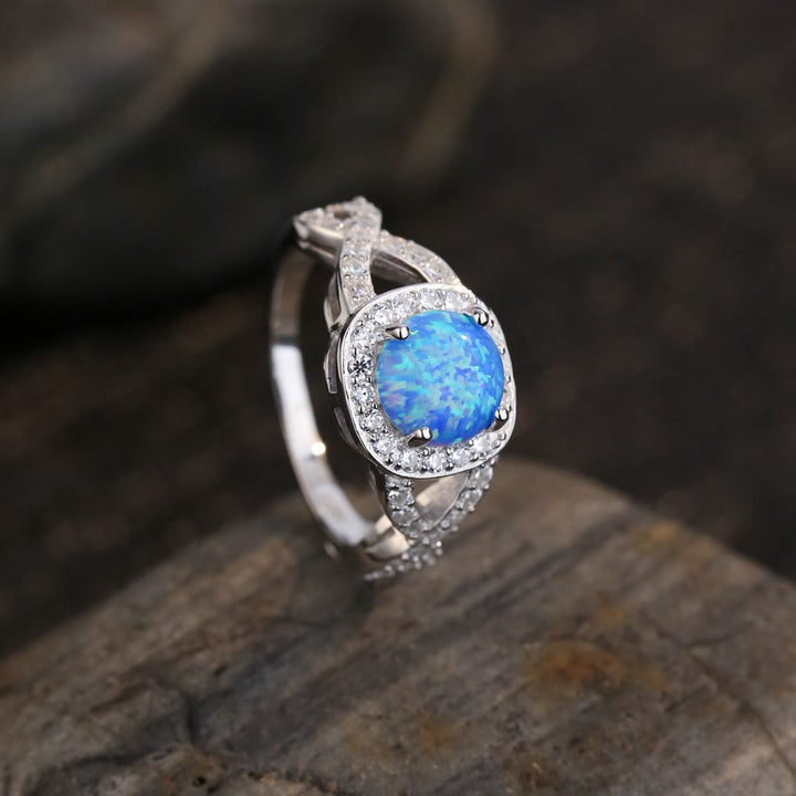 Anello Olivenorma in argento sterling 925 con zircone bianco e opale blu